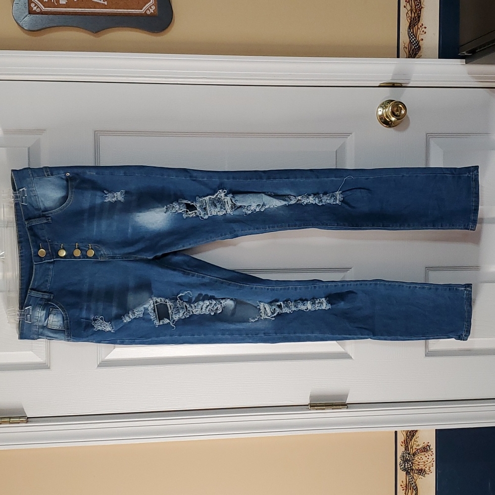 Distressed straight leg jeans with button front in size Large